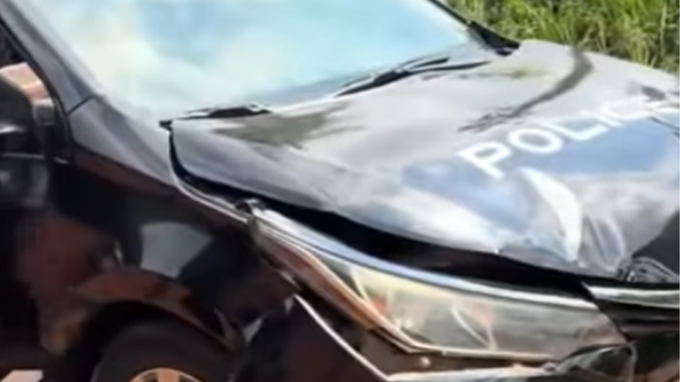Police Patrol Car Involved in Collision with Trotro; Officer Appears Distressed After Incident